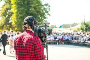 Video,Operator,Shoots,Celebration,At,School,With,Professional,Camera
